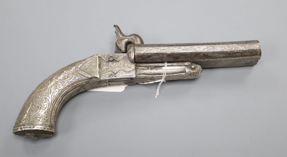 A 19th century Middle Eastern white metal mounted side by side double barrel box lock percussion pistol, 13cm barrels